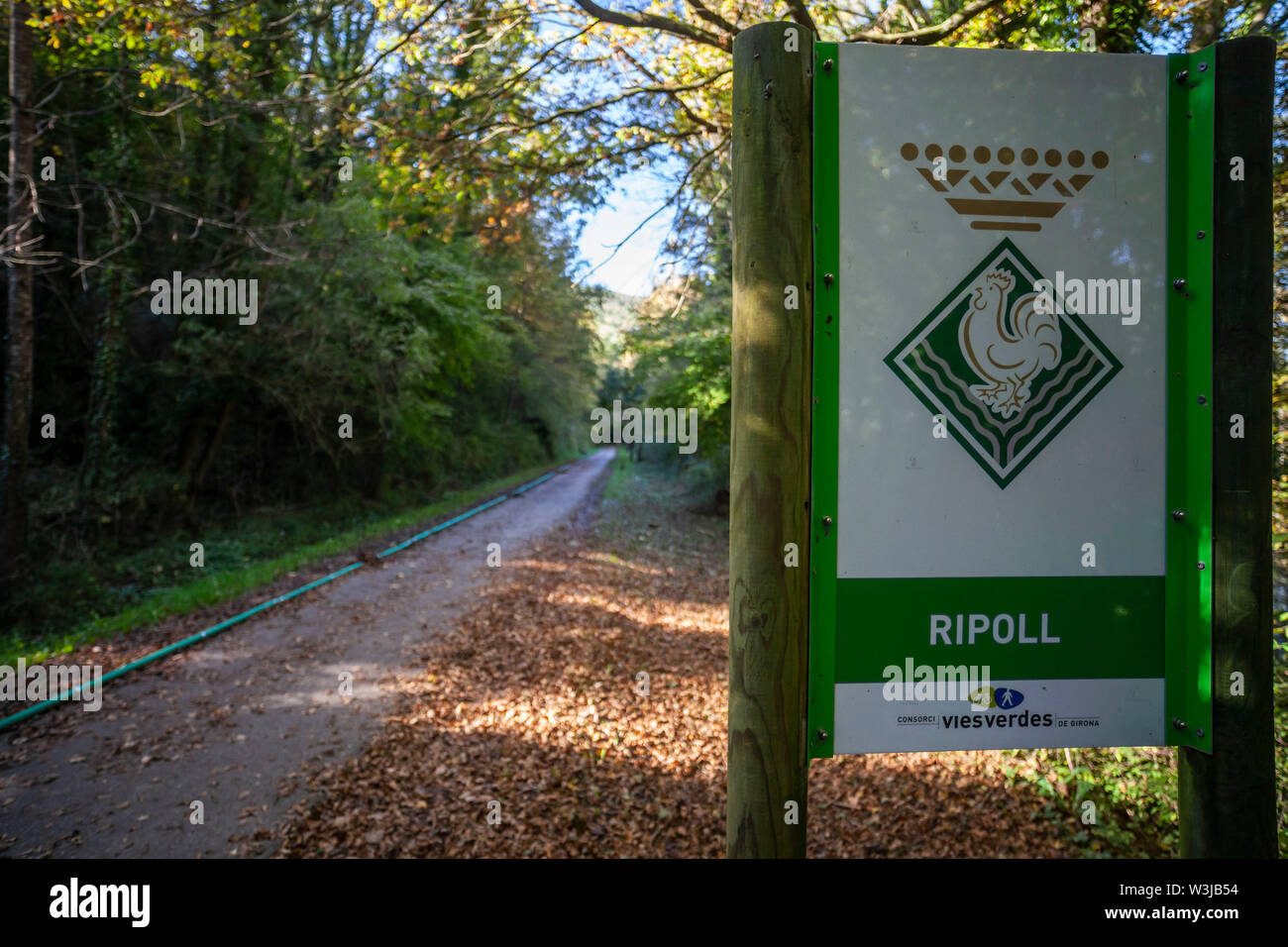 RIPOLL,SPAIN-OCTOBER 25,2018:Ruta del Ferro, Iron and Coal Route, Old railway transformed in trail walk or bike ride. Villages of Sant Joan de les Aba Stock Photo