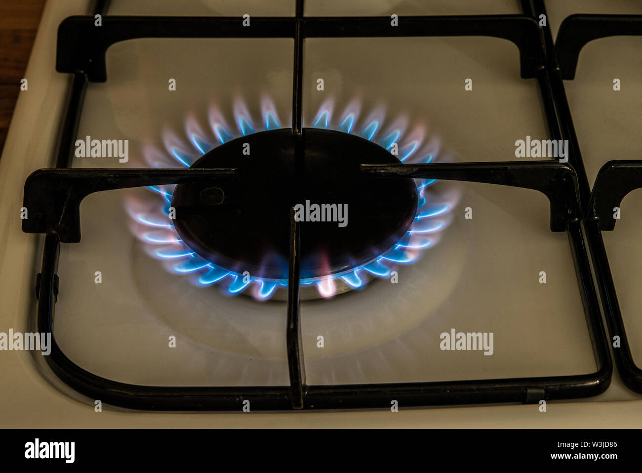 Kitchen gas hob ring alight Stock Photo Alamy