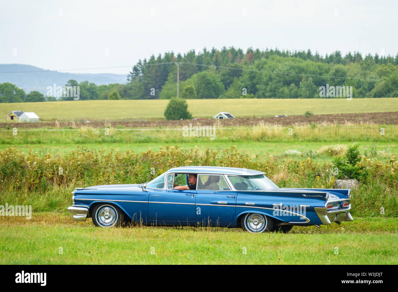 Classic old Pontiac Bonneville car in the countryside Stock Photo