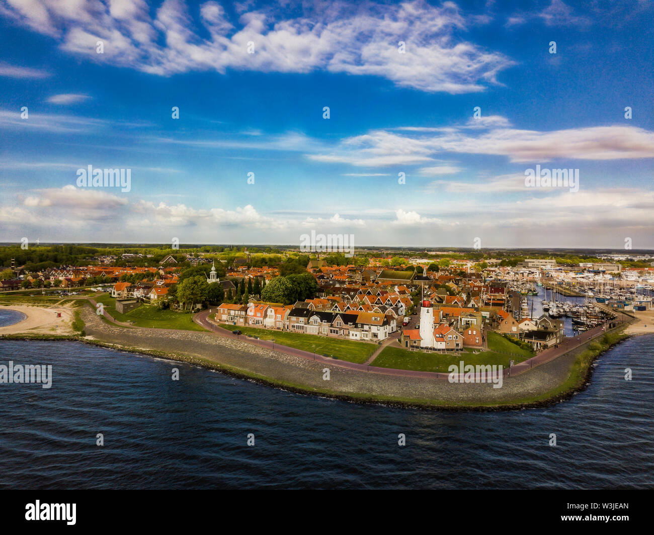 Aerial view of Urk with its lighthouse a small town on the IJsselmeer Stock Photo