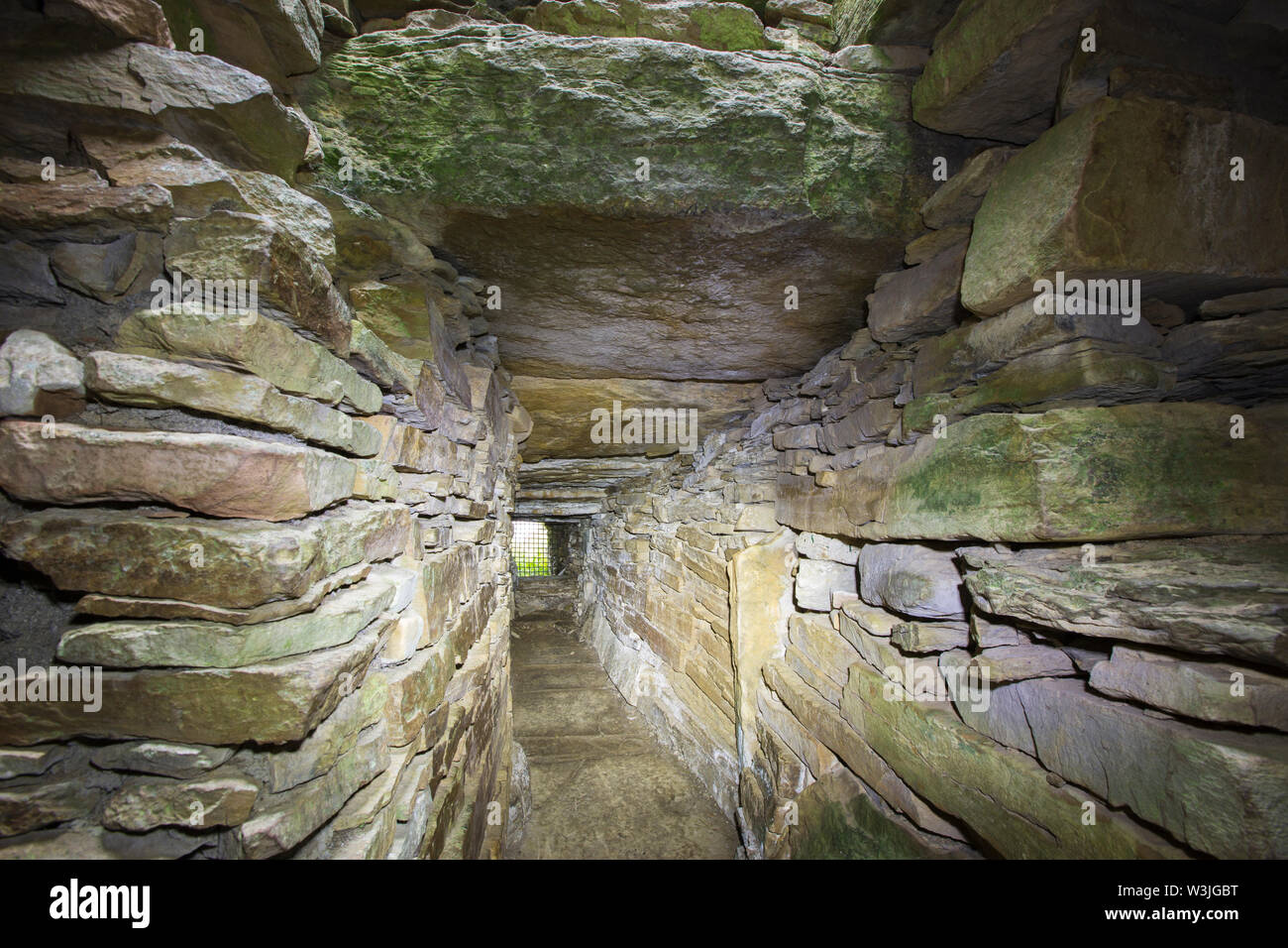 Taversöe Tuick Chambered Cairn on Rousay, Orkney, Scotland, UK. This is one of only two split level chambered cairns on Orkney. Stock Photo