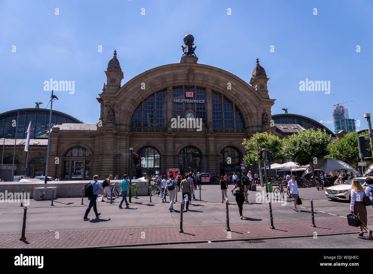 Frankfurt, Germany - July 2019: Frankfurt Main Train station architecture and people around. The railway station has opened in 1899 Stock Photo