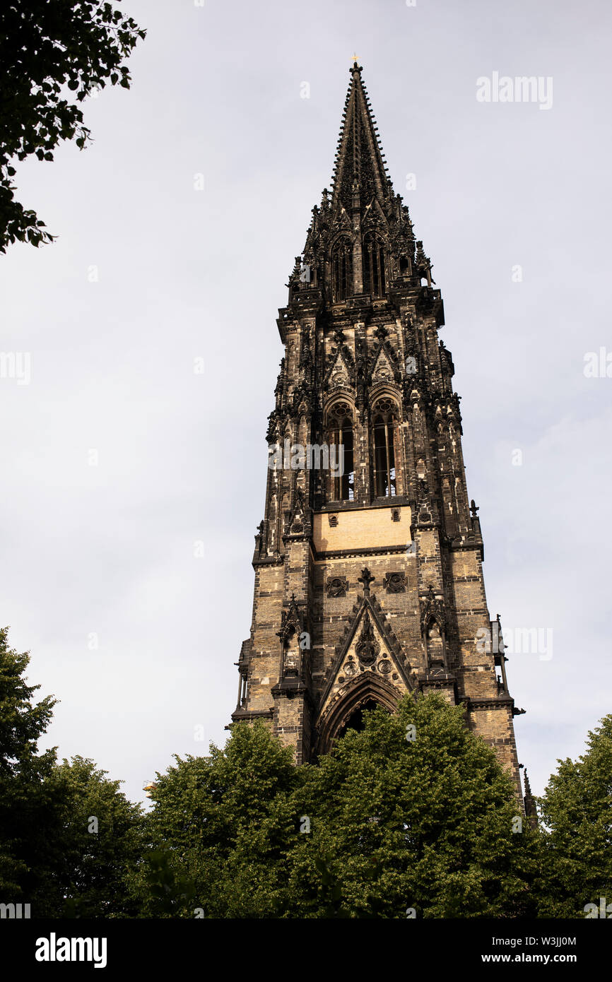 The spire of St. Nicholas church (Nikolaikirche) in Hamburg, Germany, which was damaged during bombing in World War II. Stock Photo