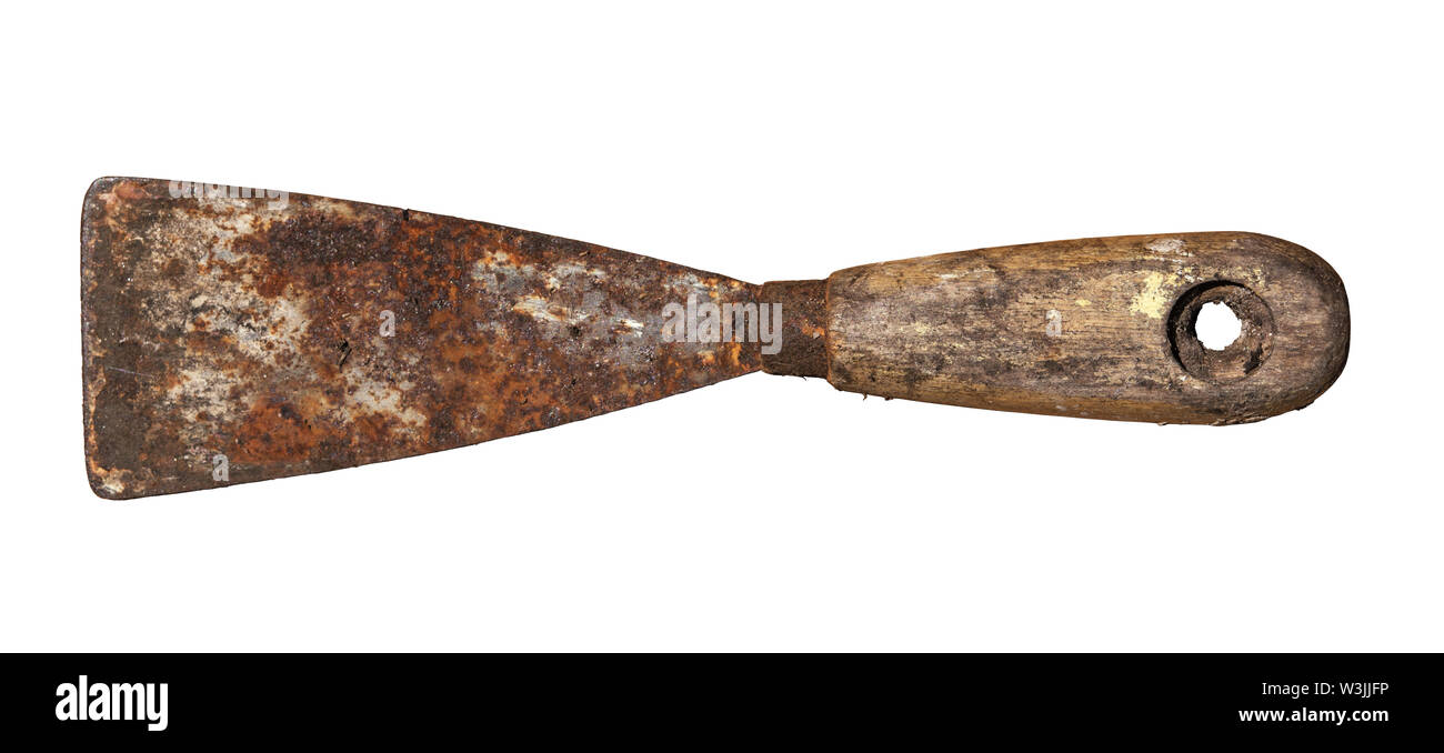 An old rusty and dirty putty knife isolated Stock Photo
