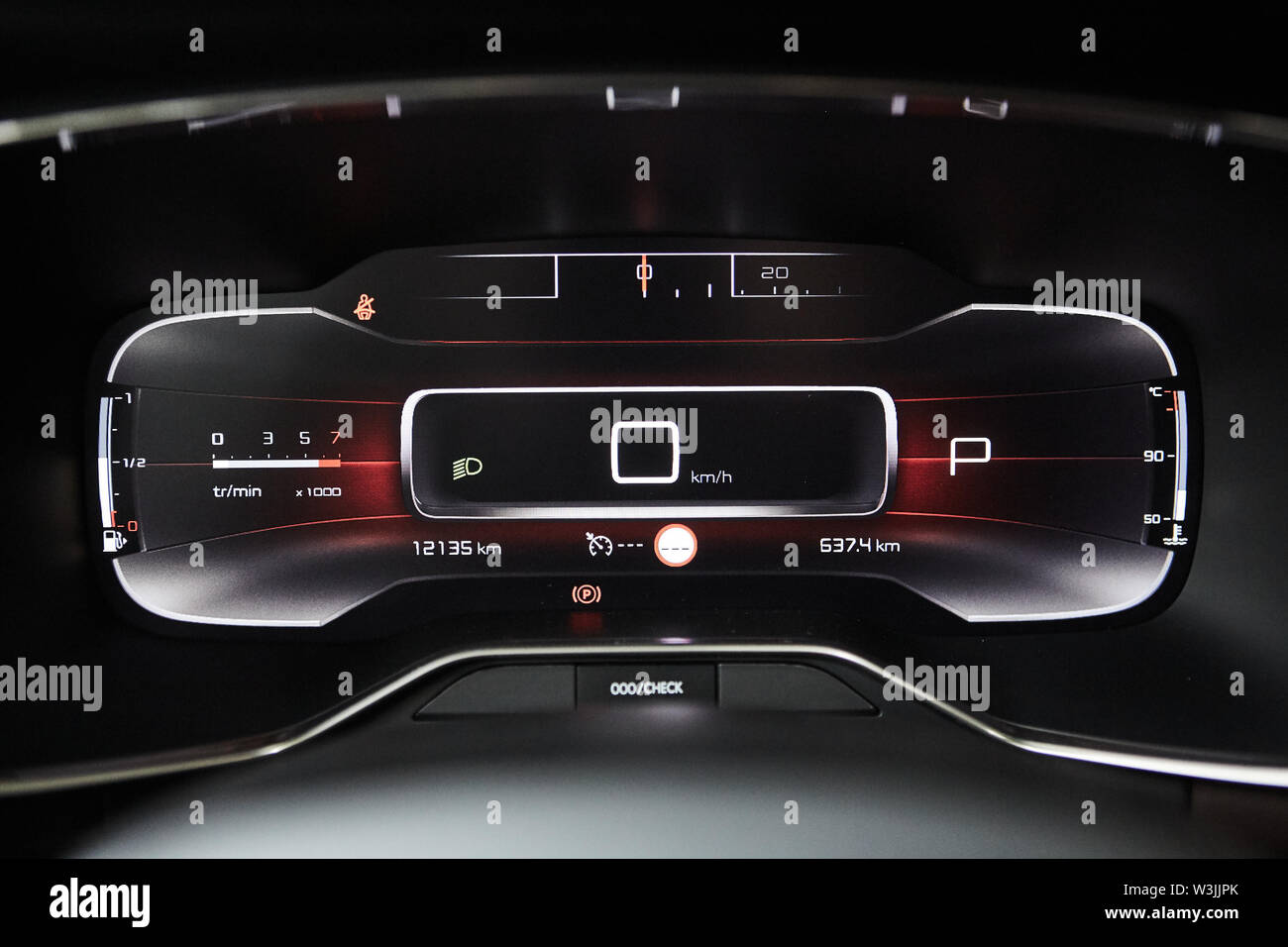 Car dashboard panel with speedometer, tachometer, odometer, fuel gauge