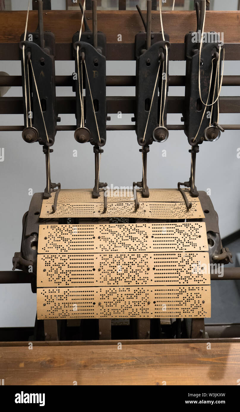 Binding machine. Used to sew together perforated cards for the Jacquard loom. Stock Photo