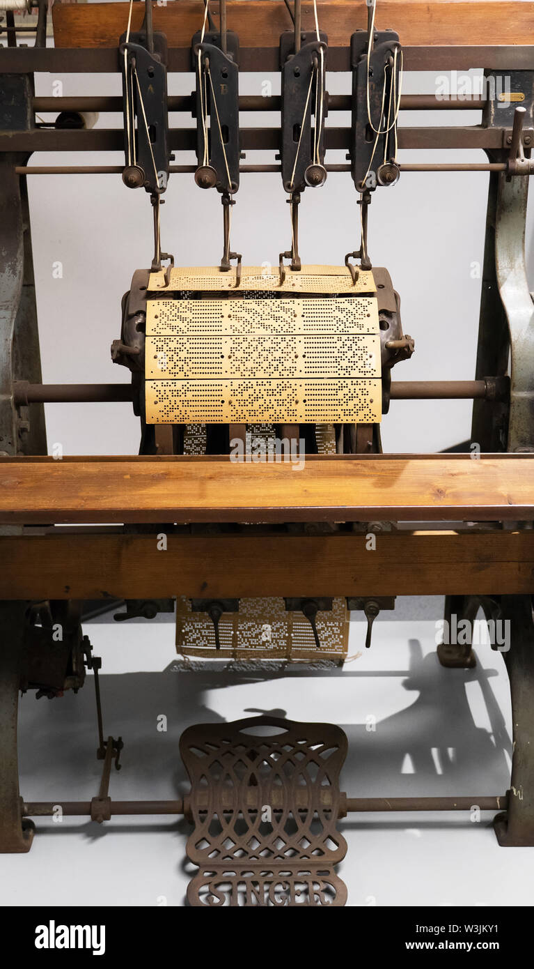 Binding machine. Used to sew together perforated cards for the Jacquard loom. Stock Photo