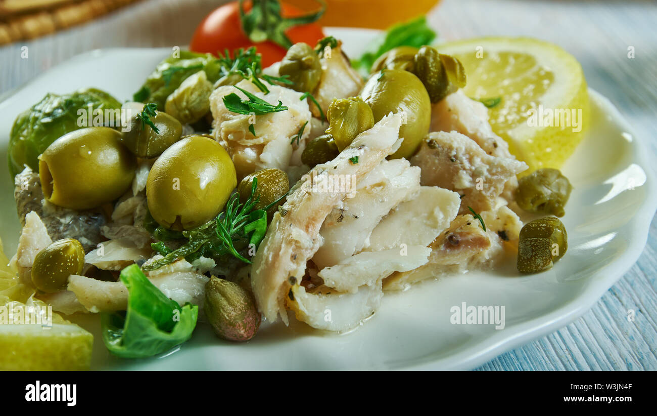Mediterranean Cod Salad with capers, olives and olive oil Stock Photo
