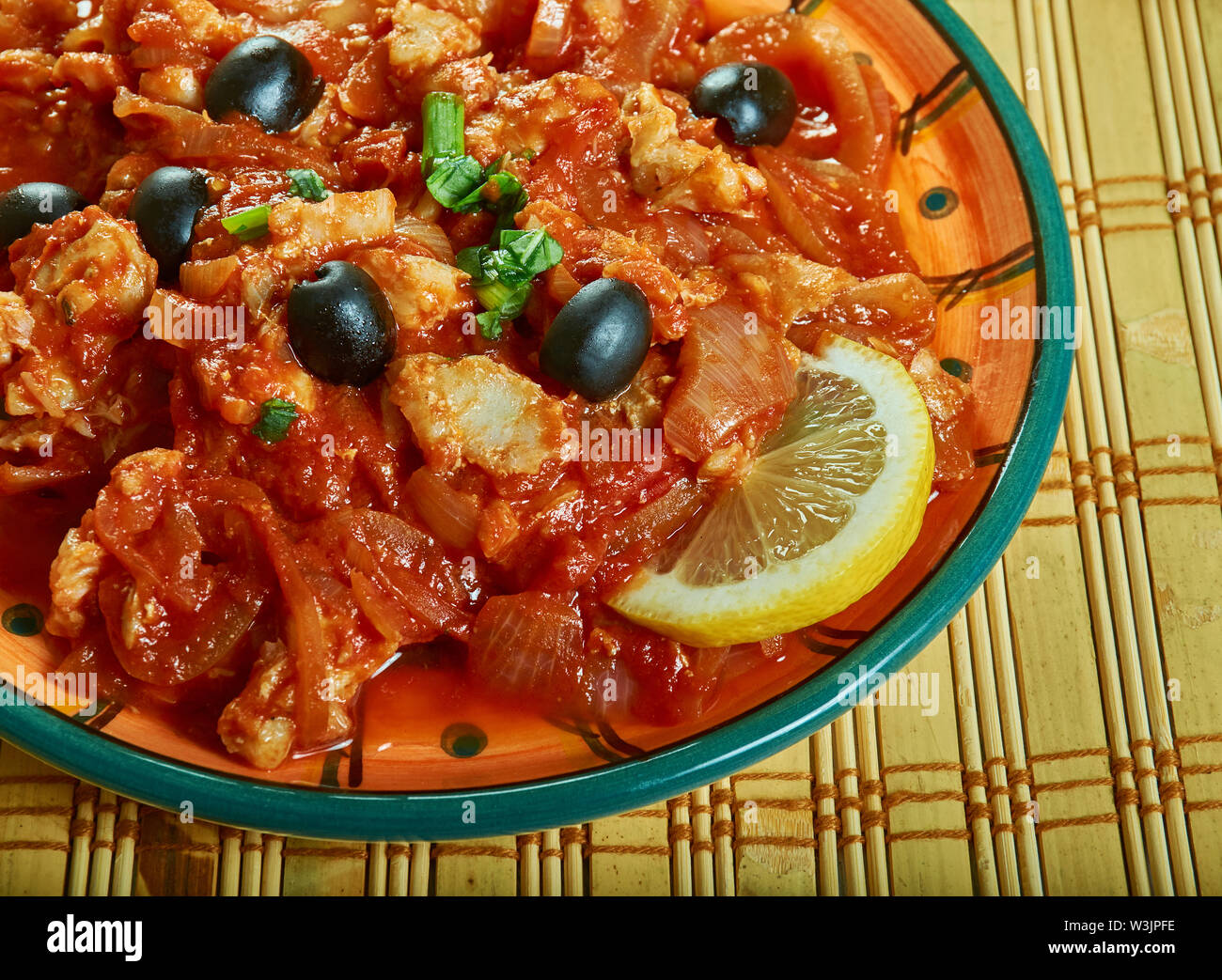Rock Cod Veracruzana, white fish in a tomato sauce with olives and