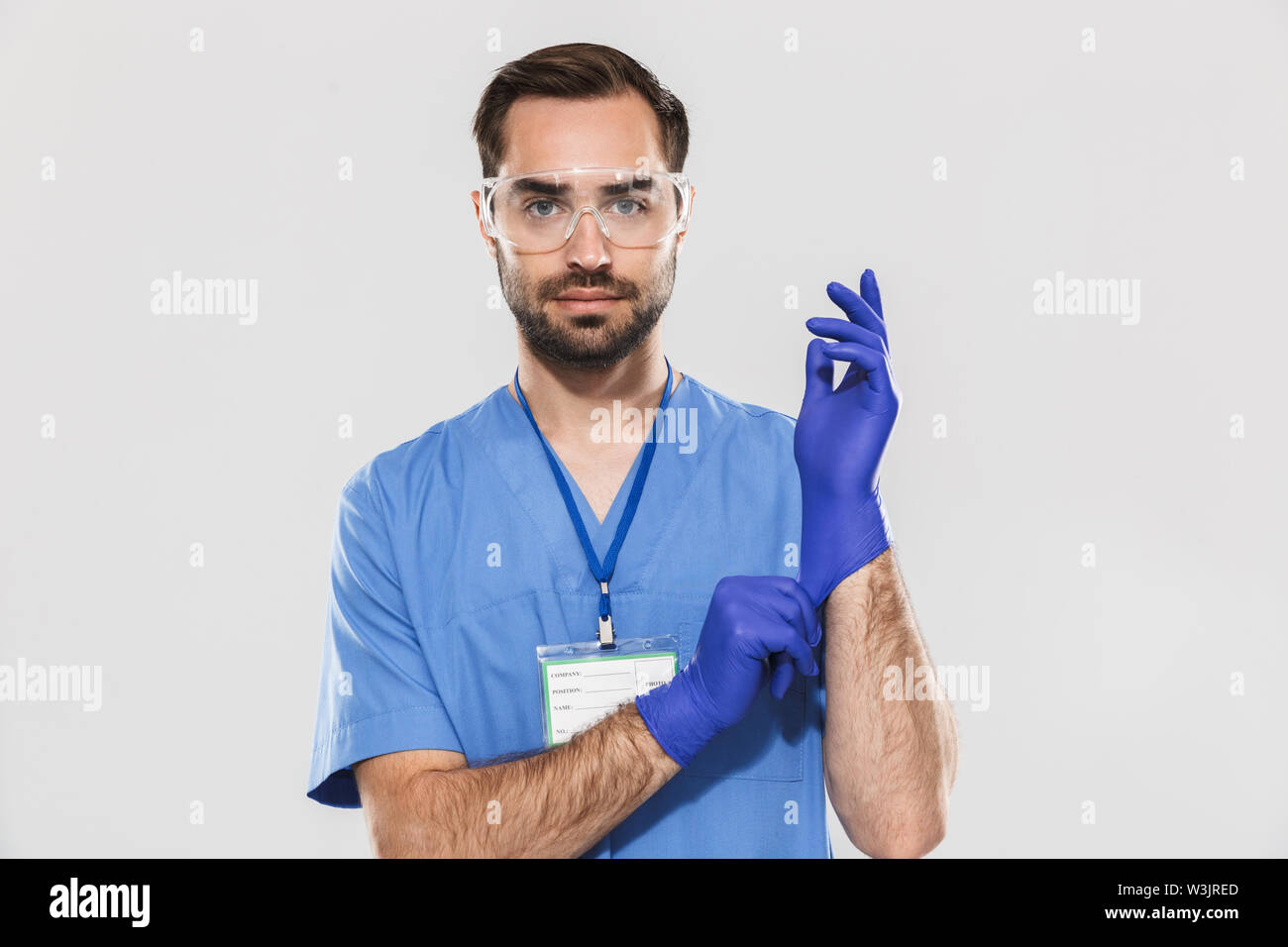 Portrait of caucasian young medical specialist working in hospital and