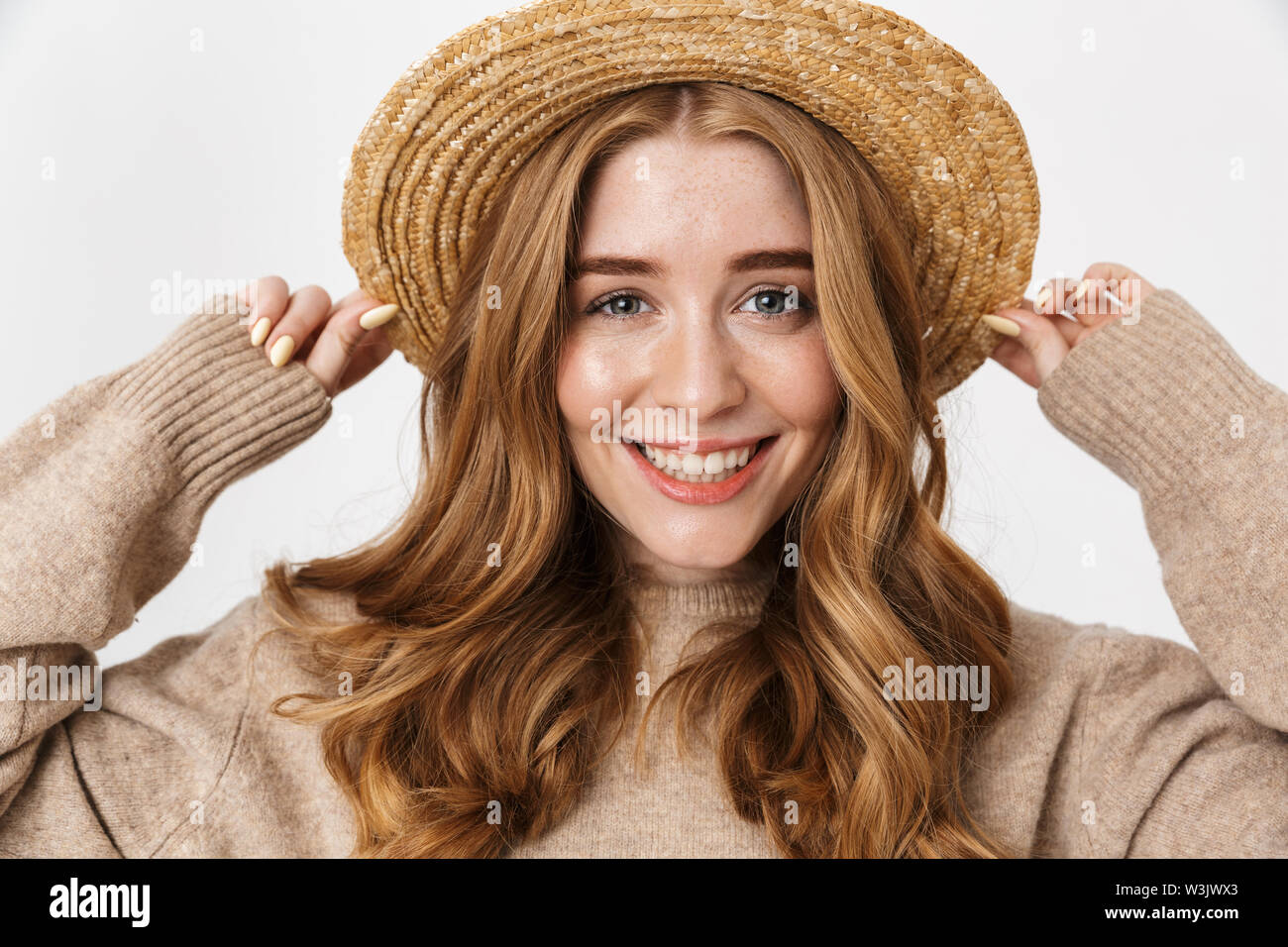 Beautiful Young Girl With Long Blond Curly Hair Wearing Sweater