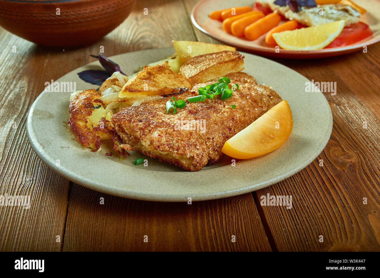 Crumbed Snapper Cajun PanFried Crumbed Fish Stock Photo Alamy