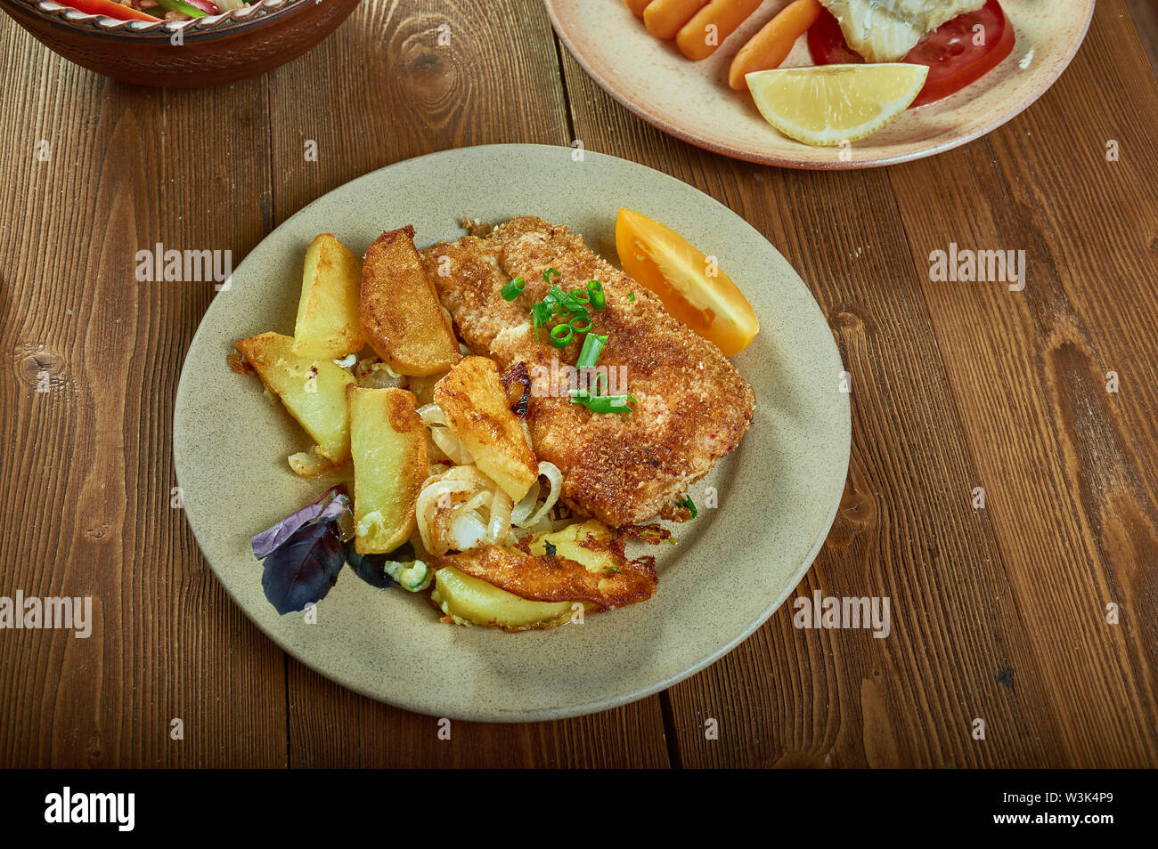 Crumbed Snapper Cajun PanFried Crumbed Fish Stock Photo Alamy