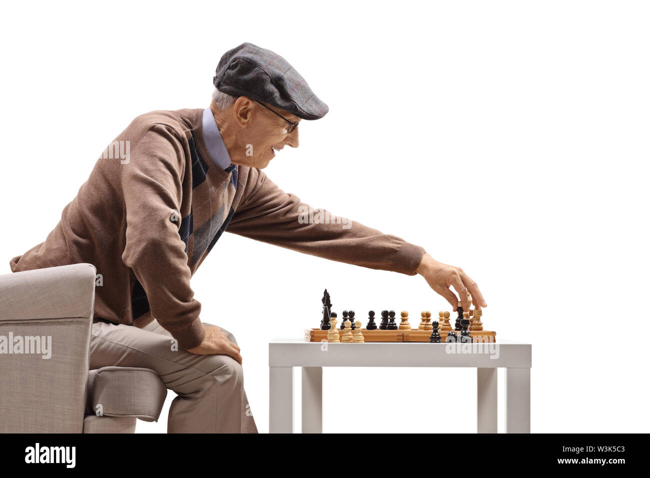 Senior man thinking about his next move in a game of chess Stock Photo by  dmytros9