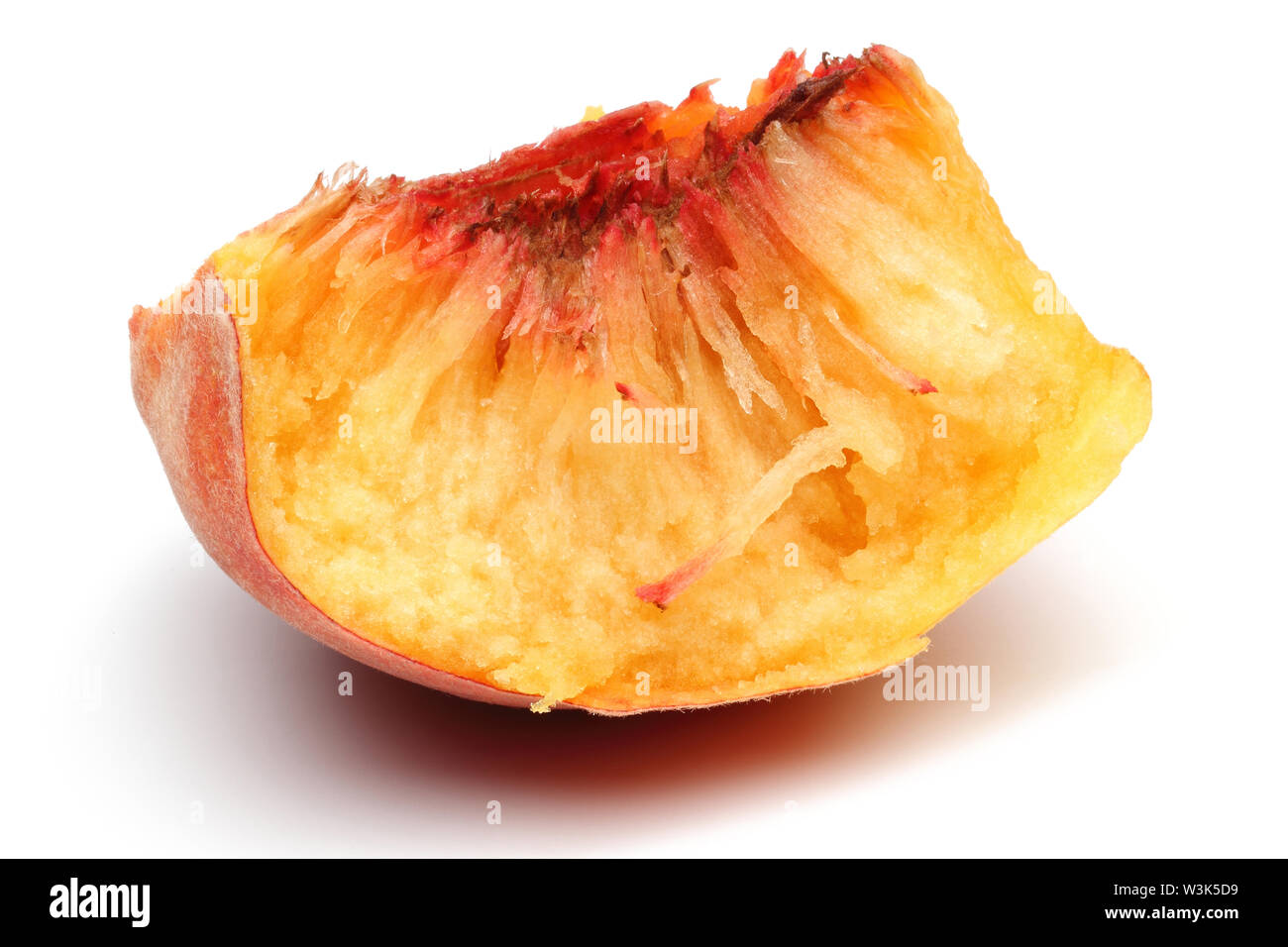 Ripe peach slice isolated on white background Stock Photo - Alamy