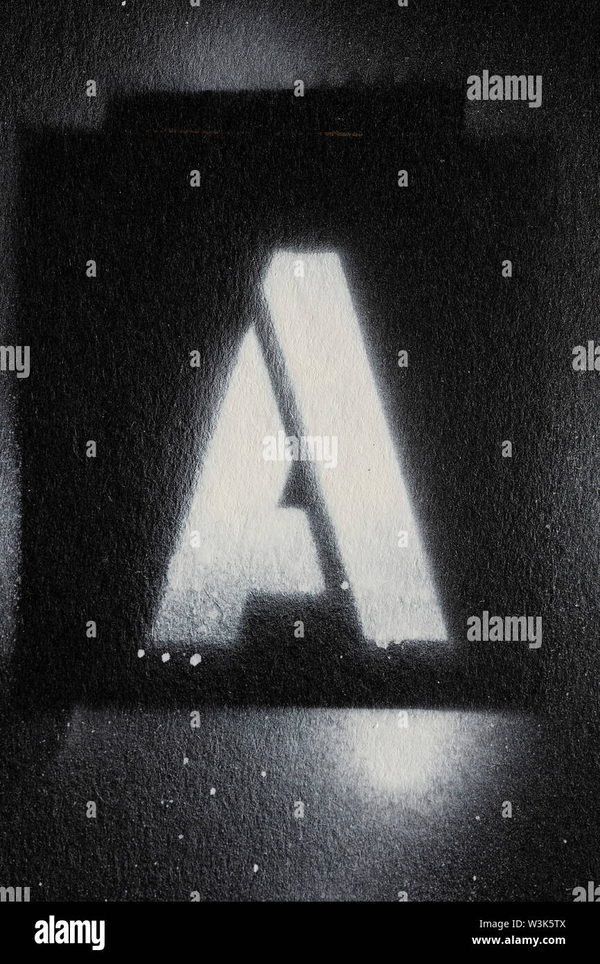 Letter A grunge spray paninted stencil font Stock Photo