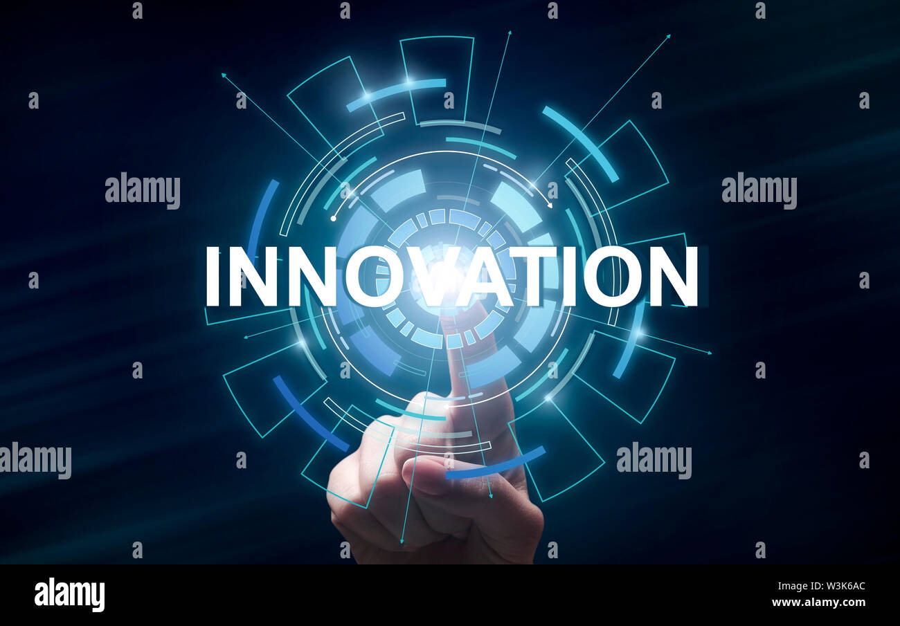 Businessman Presses Button Innovation On Virtual Screen Stock Photo
