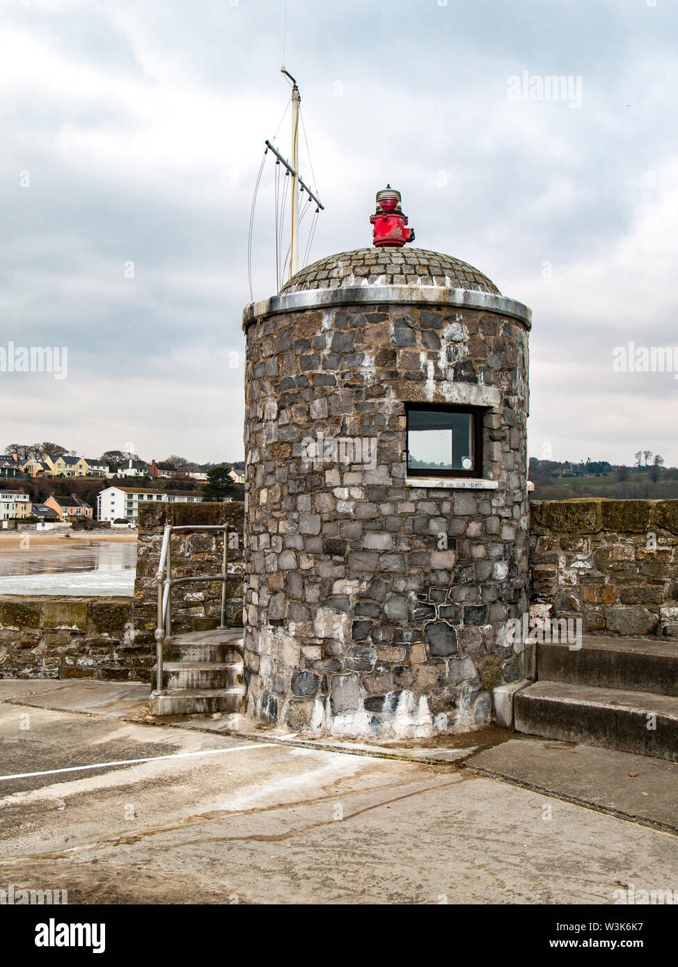 Saundersfoot harbour light beacon and lookout on the harbour wall in Pembrokeshire. Wales, UK. Stock Photo