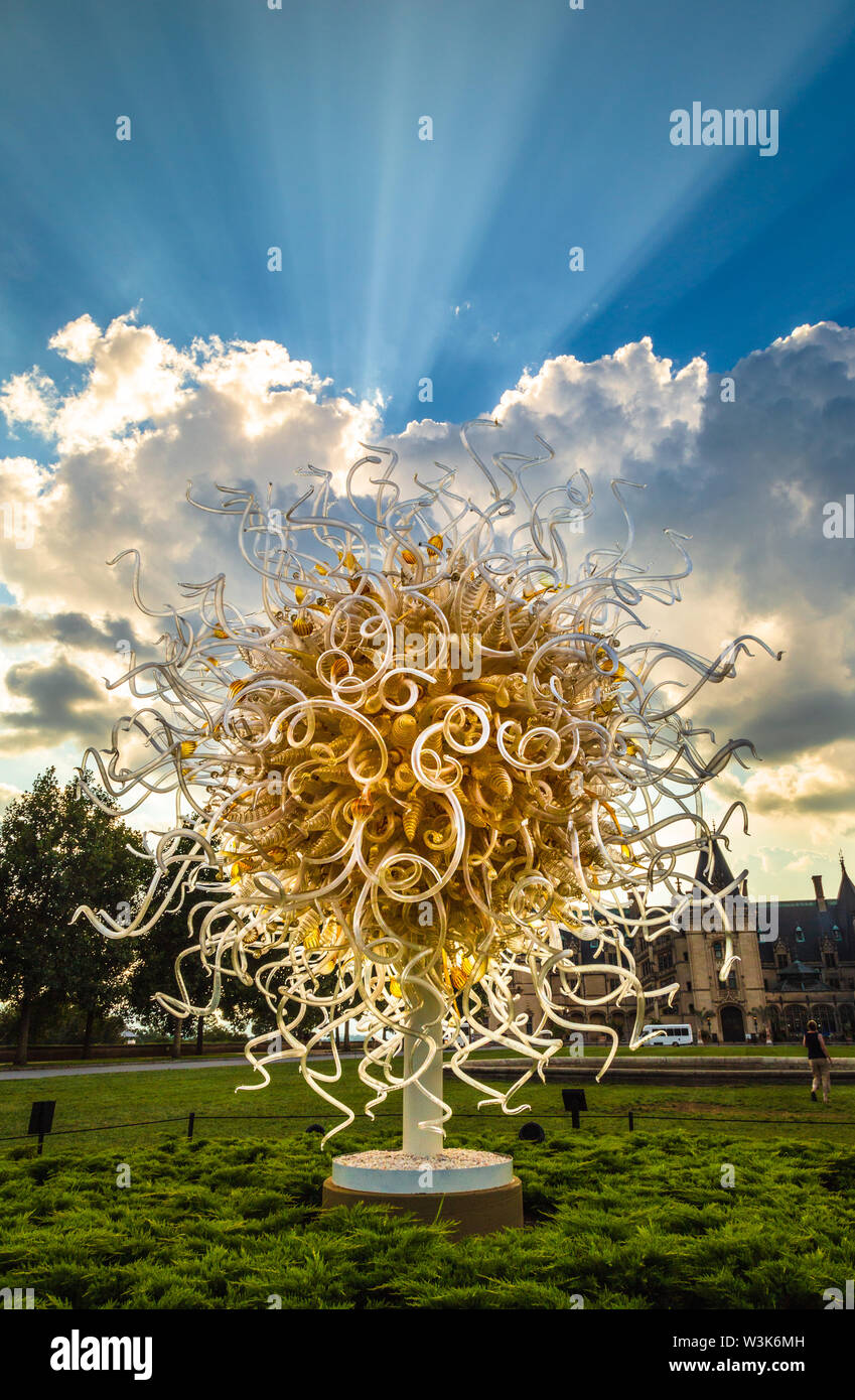 A work by glass artist Dale Chihuly in the grounds of Biltmore House, Asheville, North Carolina, USA. Stock Photo