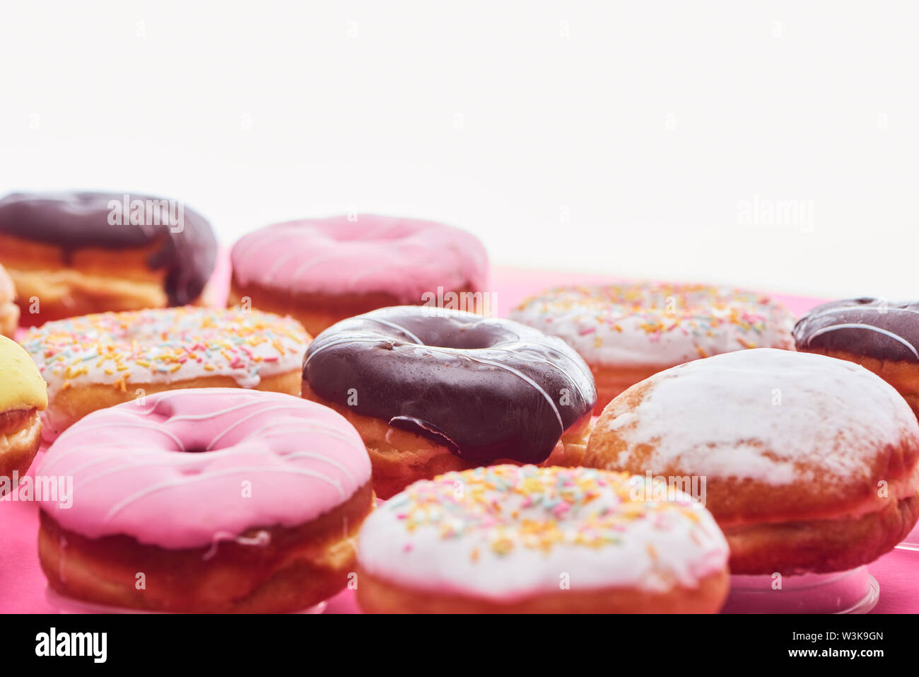 tasty glazed doughnuts isolated on white with copy space Stock Photo ...