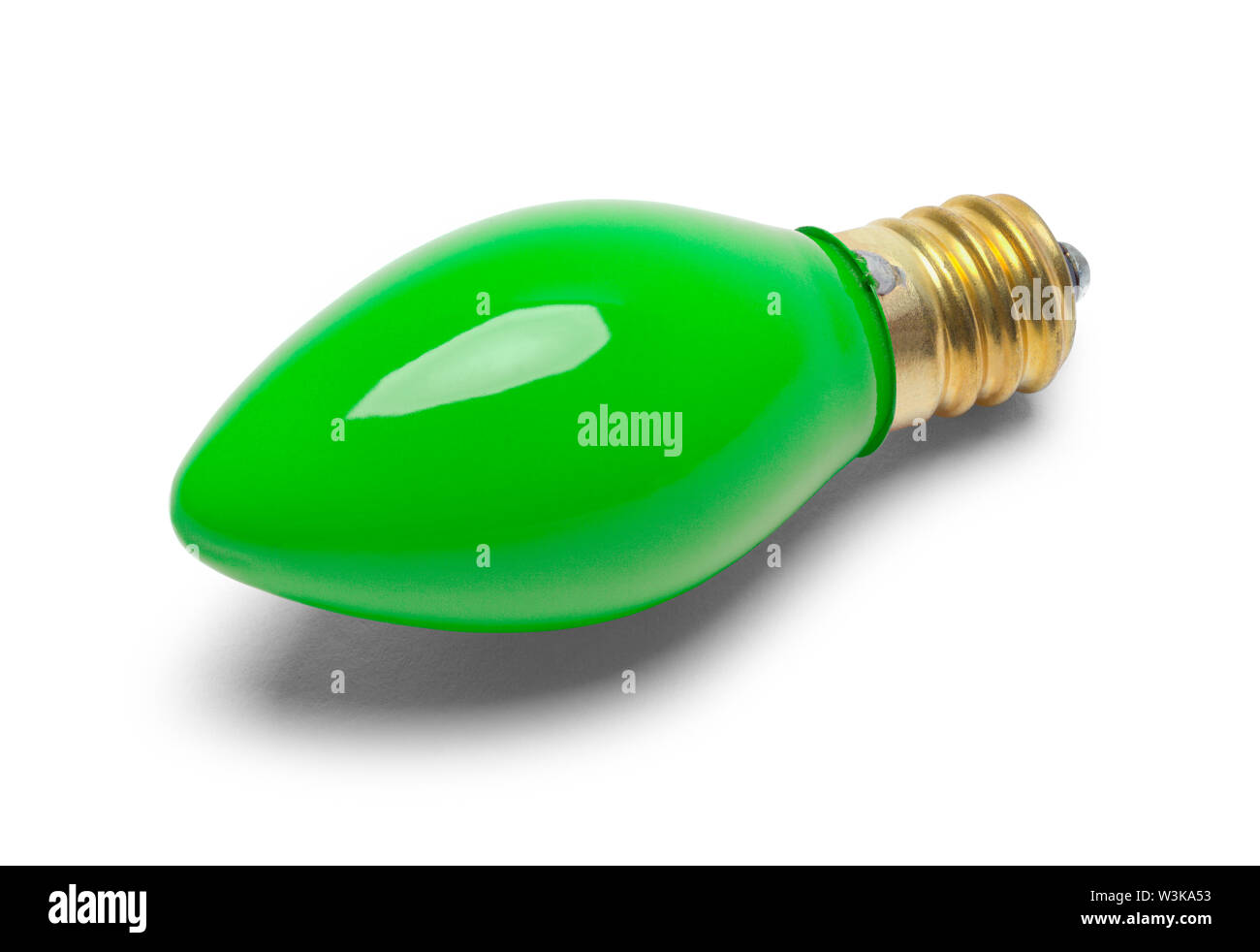 One Green Christmas Light Bulb Isolated on White. Stock Photo