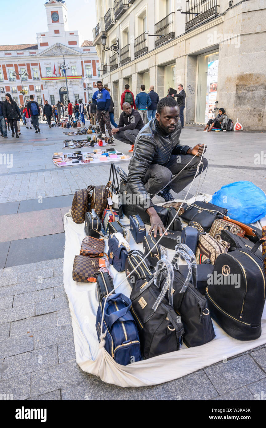 Handbag vendors selling knockoff handbags on Canal Street Lower Manhattan  New York City New York USA Stock Photo - Alamy
