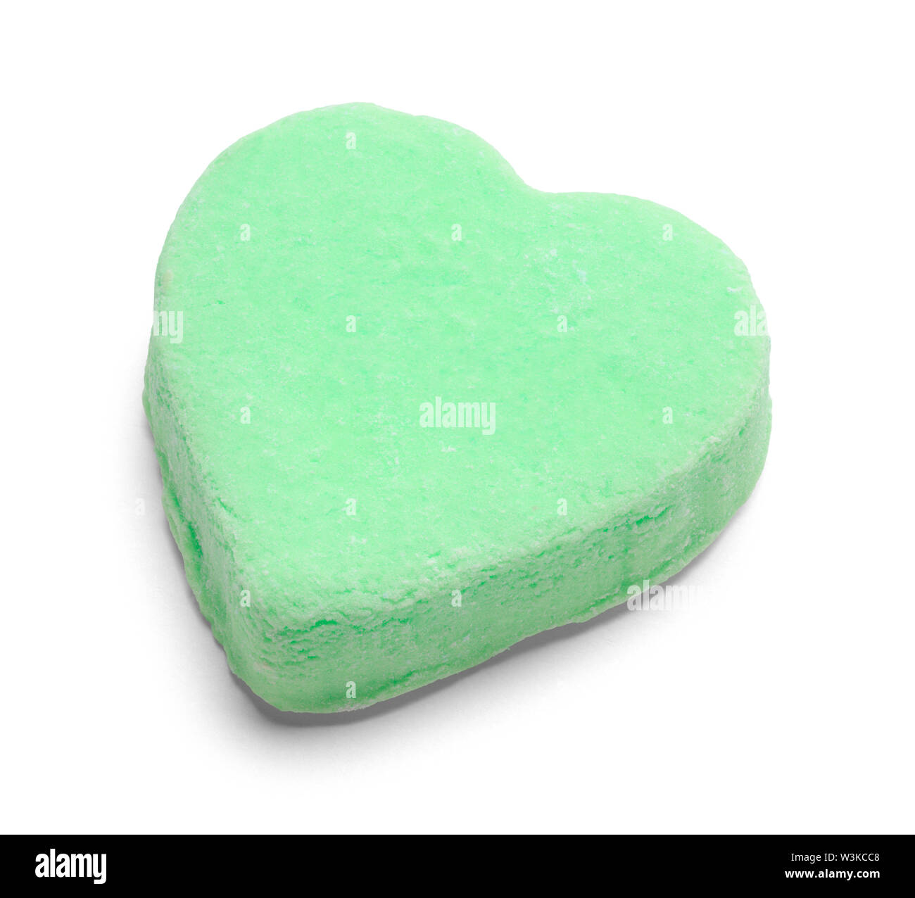 Green Valentines Candy Heart Isolated on White. Stock Photo