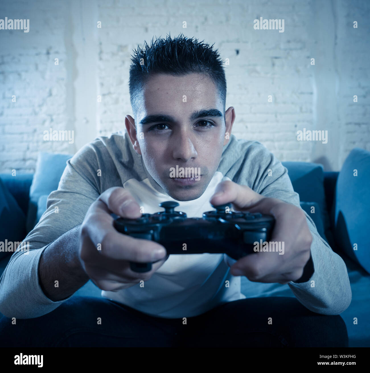 Having Fun at Home. Cheerful Black Teen Guy with Joystick Playing Online  Computer Games, Sitting on Couch Indoors Stock Image - Image of computer,  person: 227478857