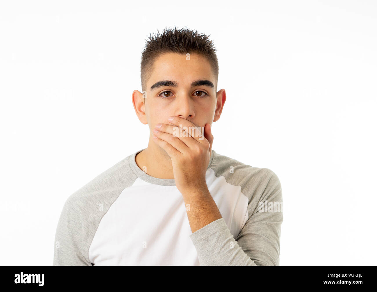 Portrait Of Young Man In Shock With A Scared Face Expression