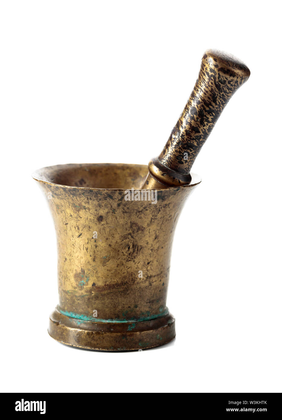 Vintage brass mortar and pestle isolated on a white background Stock