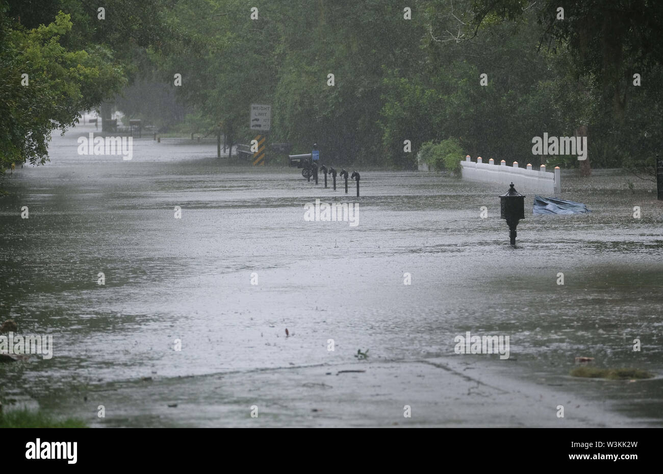 July 13, 2019 - Mandeville, LOUISIANA, U.S - A flooded road near Lake Pontchartrain in Mandeville, Louisiana USA as Hurricane Barry makes landfall on July 13, 2019. (Credit Image: © Dan Anderson/ZUMA Wire) Stock Photo