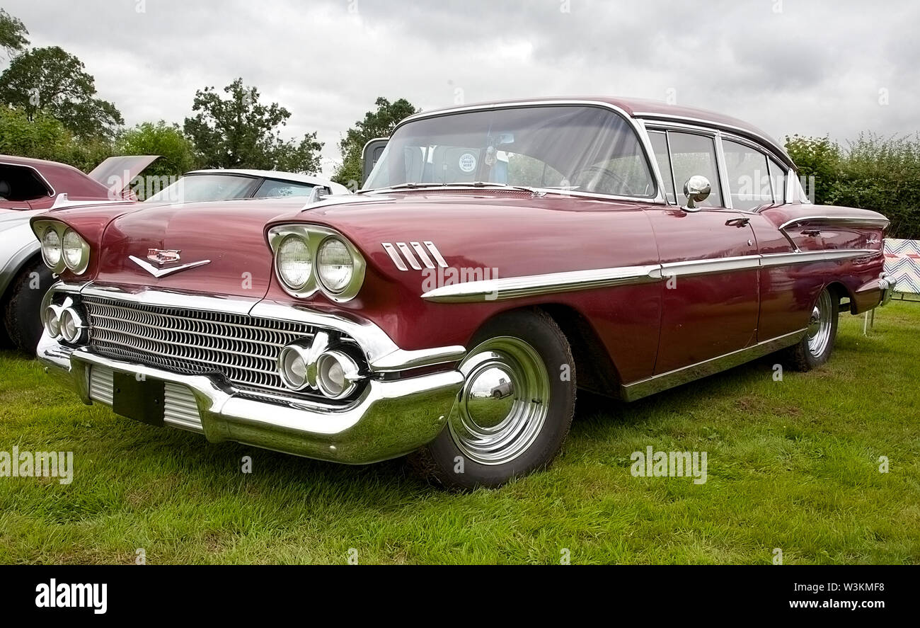 A red Chevrolet Impala automobile on show at a classic car show in Wales, UK Stock Photo