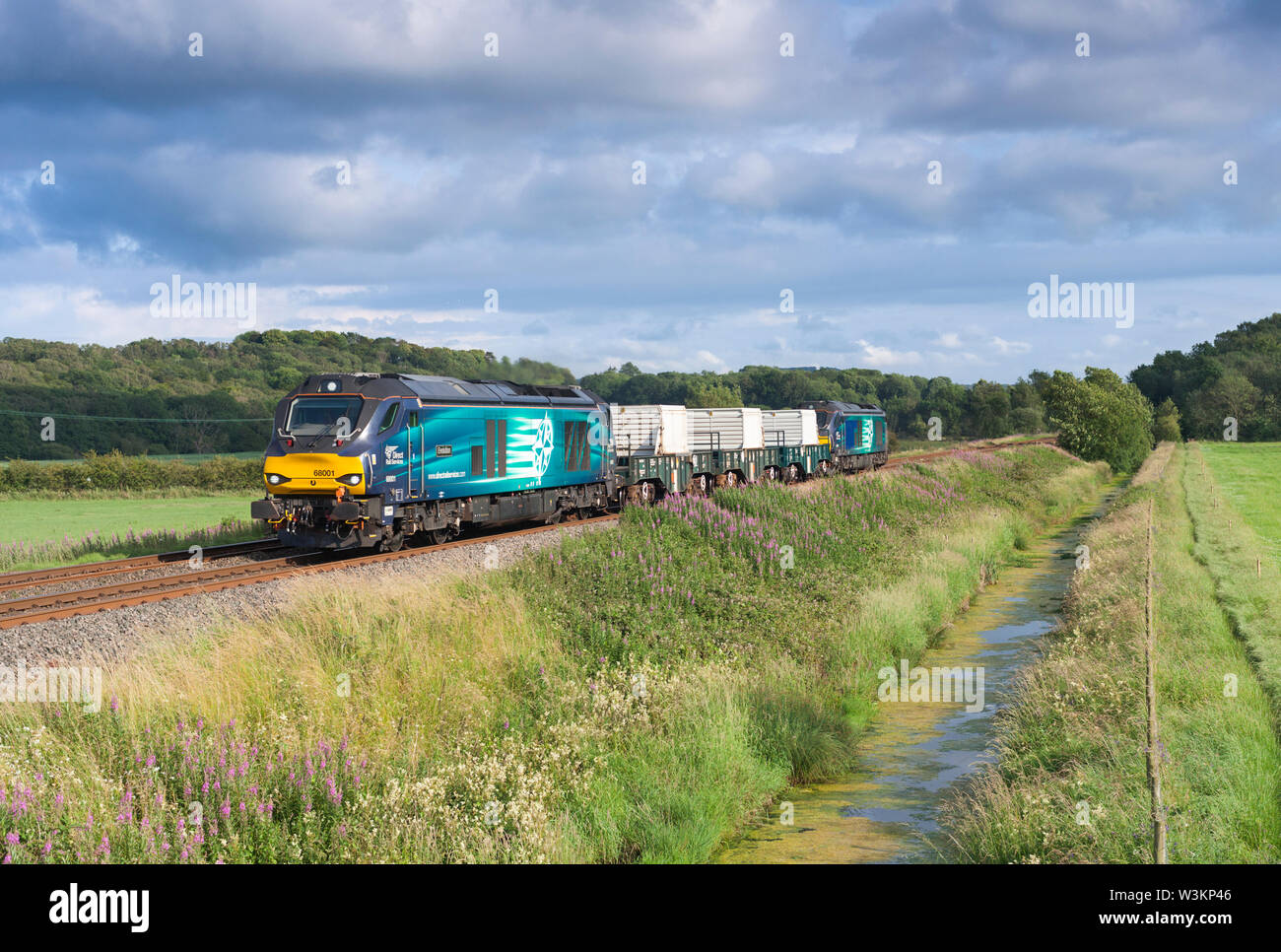 2  Direct rail Services Stadler class 68 locomotives on the Cumbrian coast railway line with a nuclear flask train from Heysham to Sellafield Stock Photo