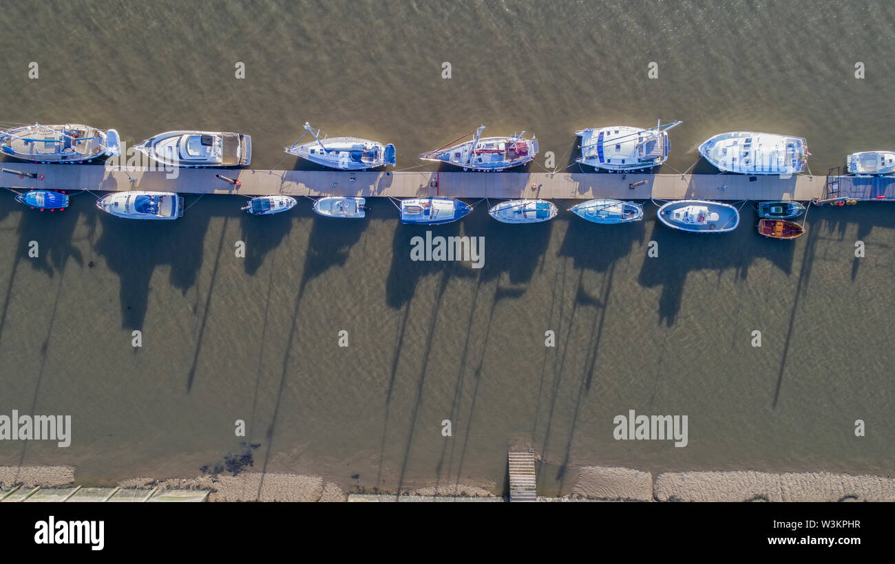 Boats tied up on a river hi-res stock photography and images - Alamy