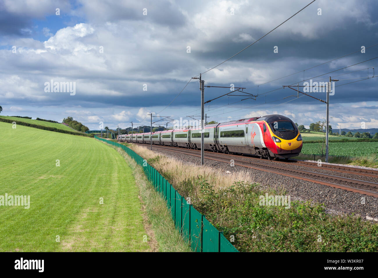 Virgin trains west coast class 390 Pendolino train on the west coast mainline in Cumbria with a