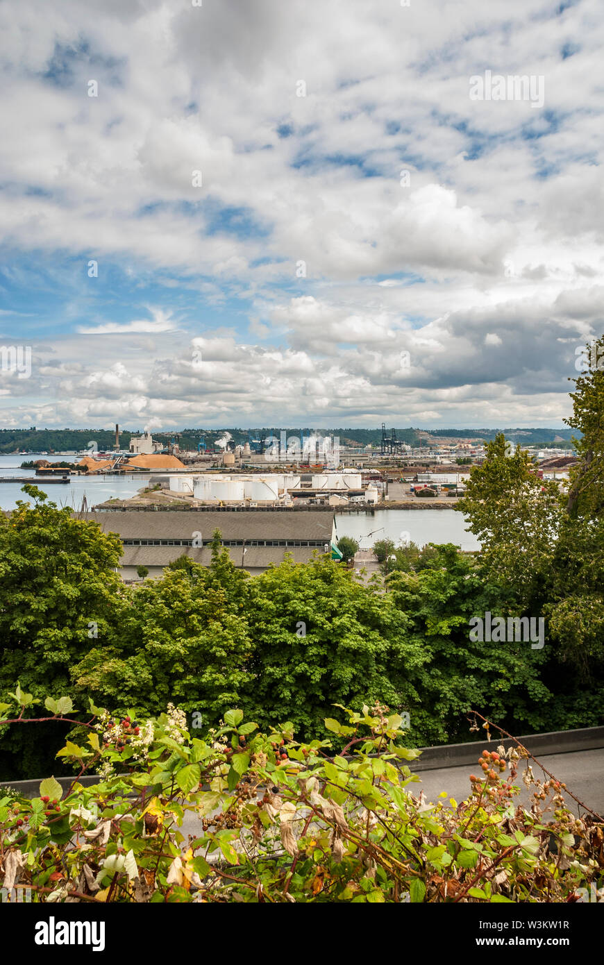 View of a waterway with industrial facilities in Tacoma, Washington. Stock Photo