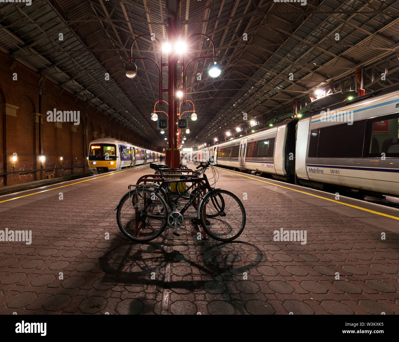 Bikes at a railway station hi-res stock photography and images - Alamy