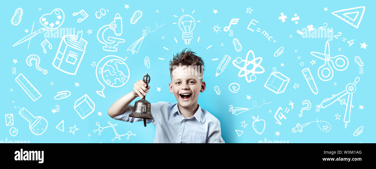 a boy in a light shirt smiles and rings a bell. Around it are various ...