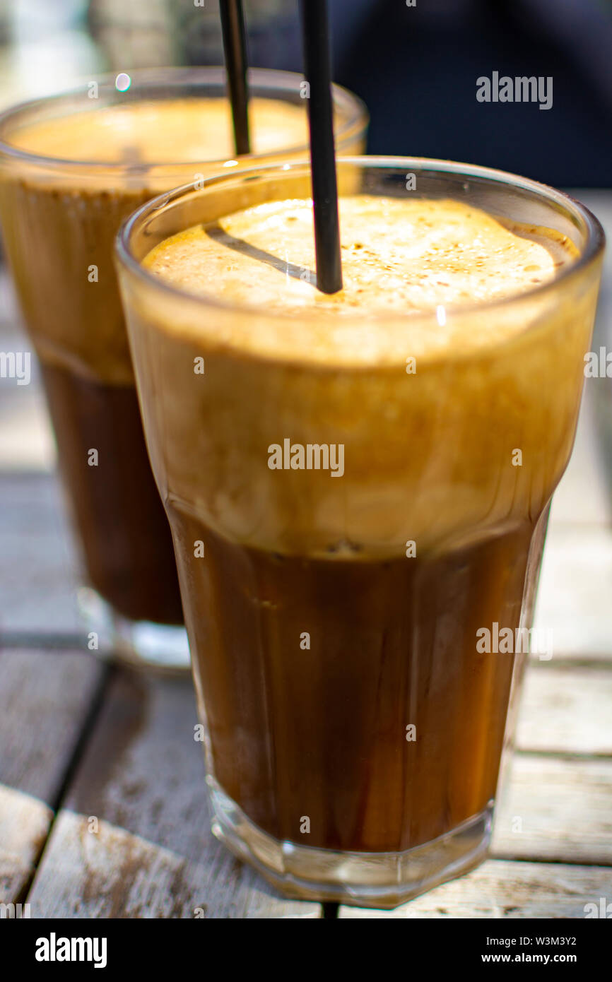 https://c8.alamy.com/comp/W3M3Y2/traditional-greek-cold-coffee-frappe-with-foam-made-from-water-instant-coffee-and-ice-cubes-in-glass-close-up-W3M3Y2.jpg