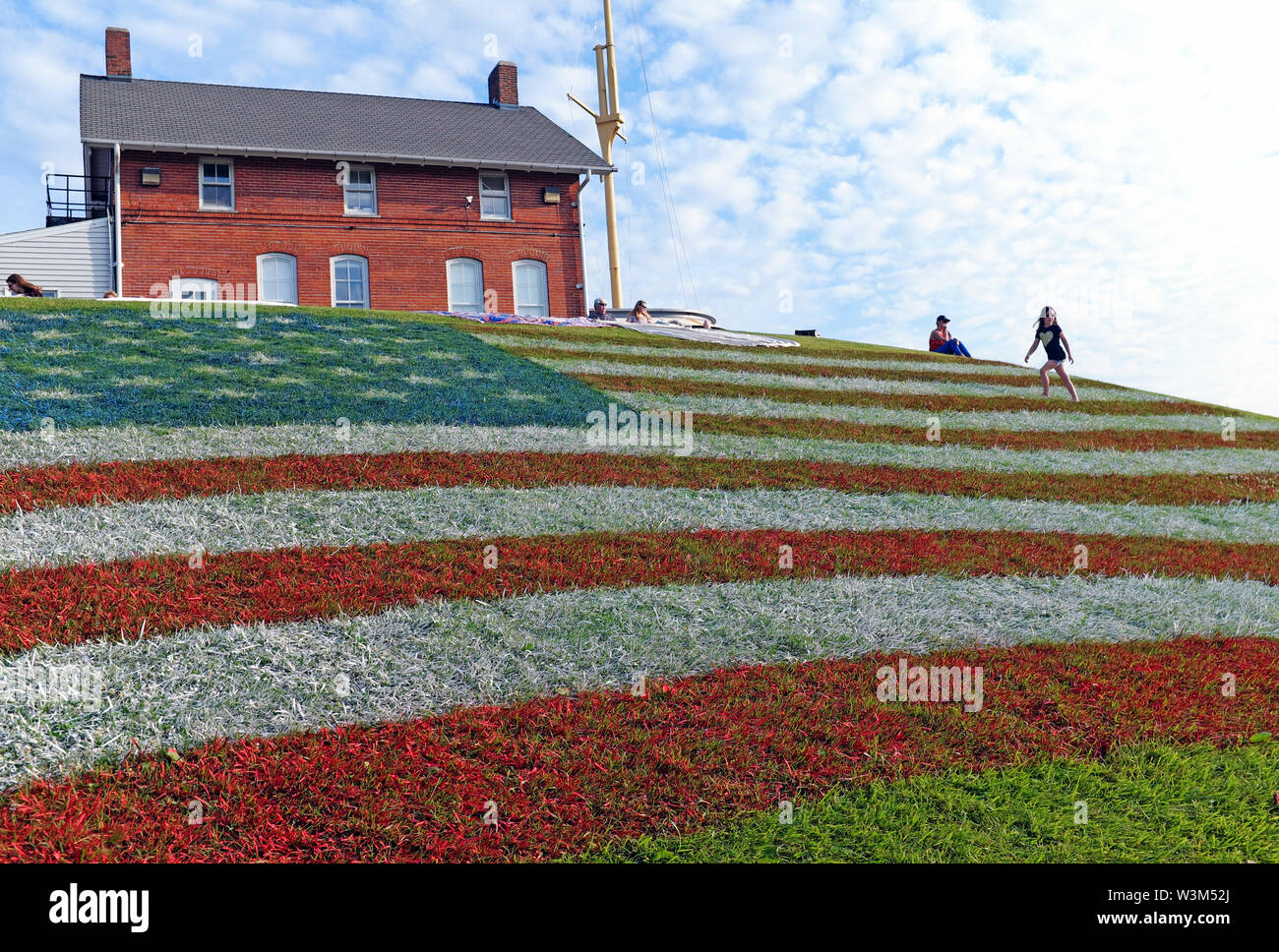 The USA Flag is uniquely displayed on a hillside in Fairport Harbor, Ohio, USA. Stock Photo