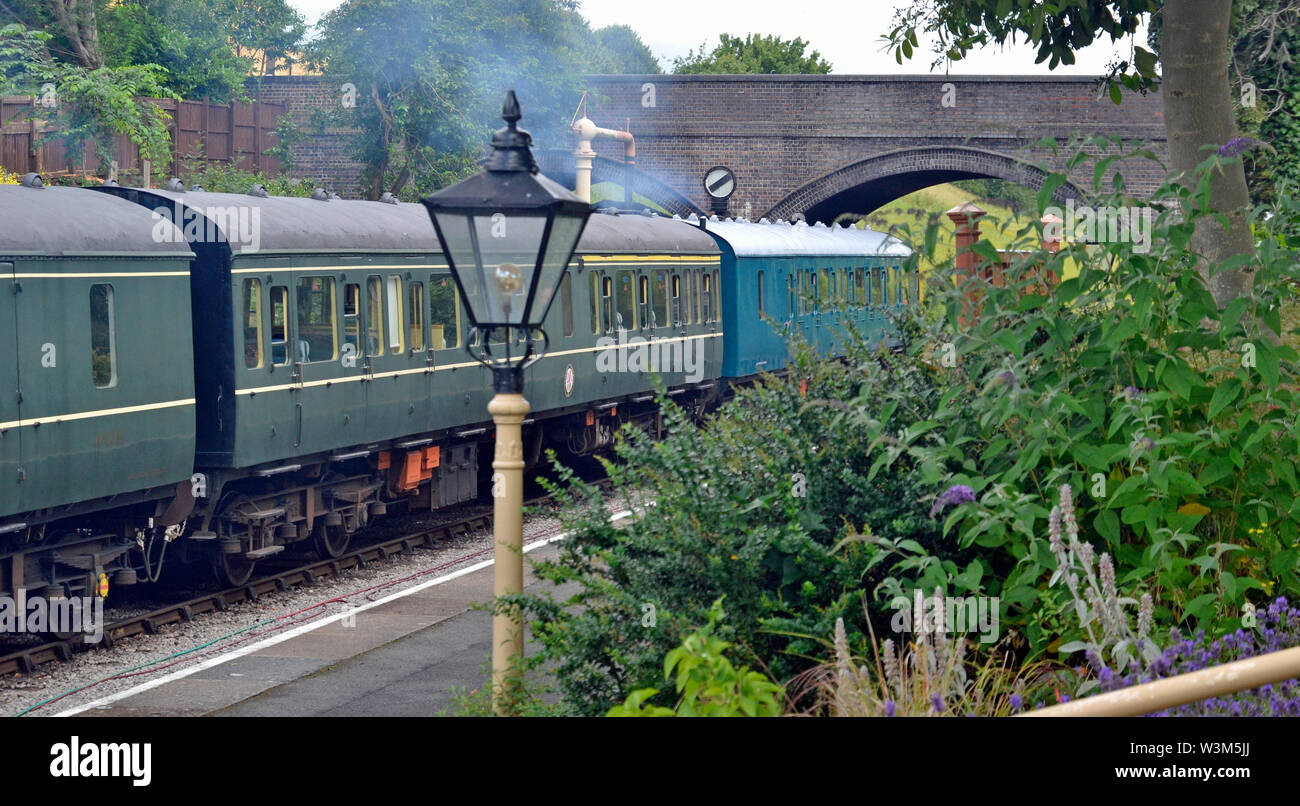 Diesel train departing from Toddington Railway Station. Part of the Gloucestershire Warwickshire Railway. Heritage railway. Stock Photo