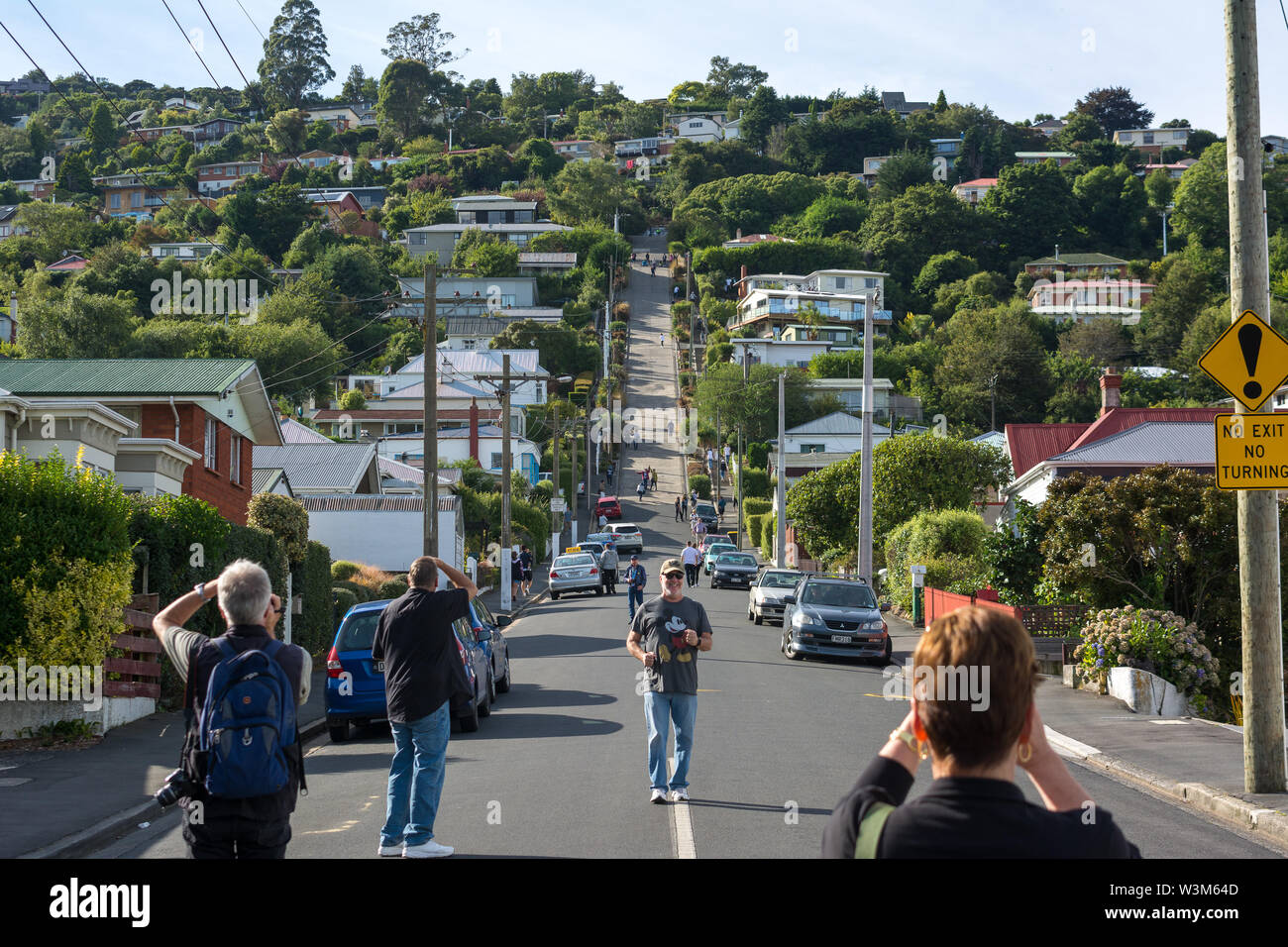 Dunedin, Otago, New Zealand. 4th February 2018. People taking photos and posing for pictures on Baldwin Street. Credit: Jonathan Stock Photo
