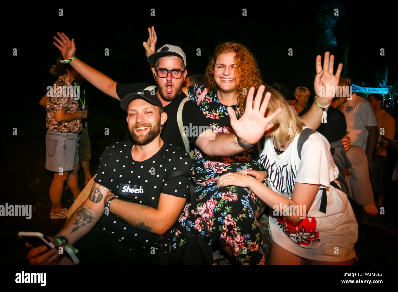 Zagreb, Croatia - 26th June, 2019 : Visitors of 3rd day of the 14th INmusic festival located on the lake Jarun in Zagreb, Croatia. Group of friends en Stock Photo