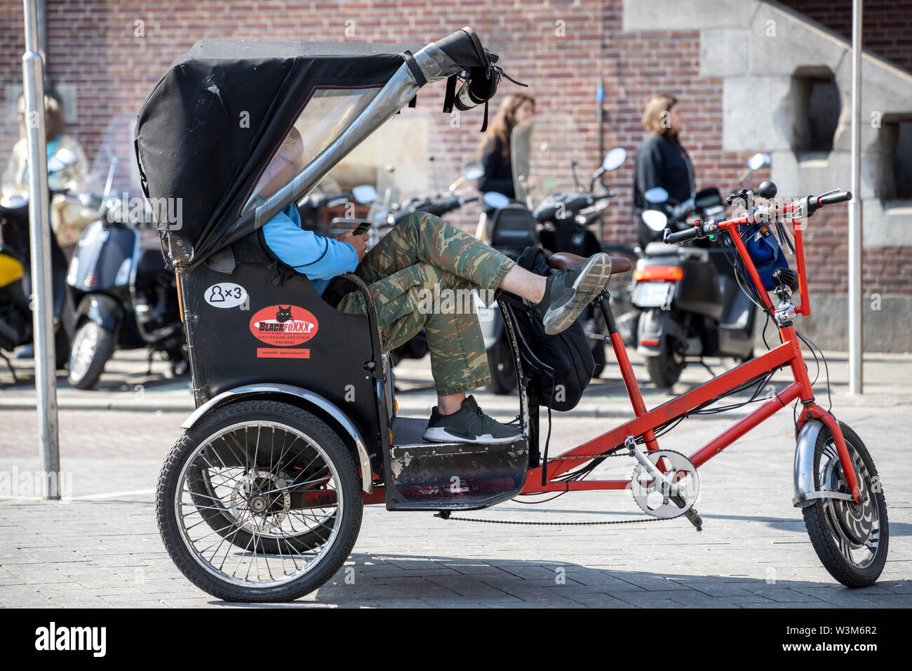 Amsterdam, Netherlands, downtown, bicycle taxis, rickshaws, on Dam Square, Stock Photo