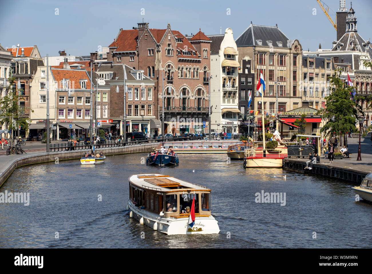 Amsterdam, Netherlands, city centre, old town, canal boat mooring, cruise boats on the Rokin, Stock Photo