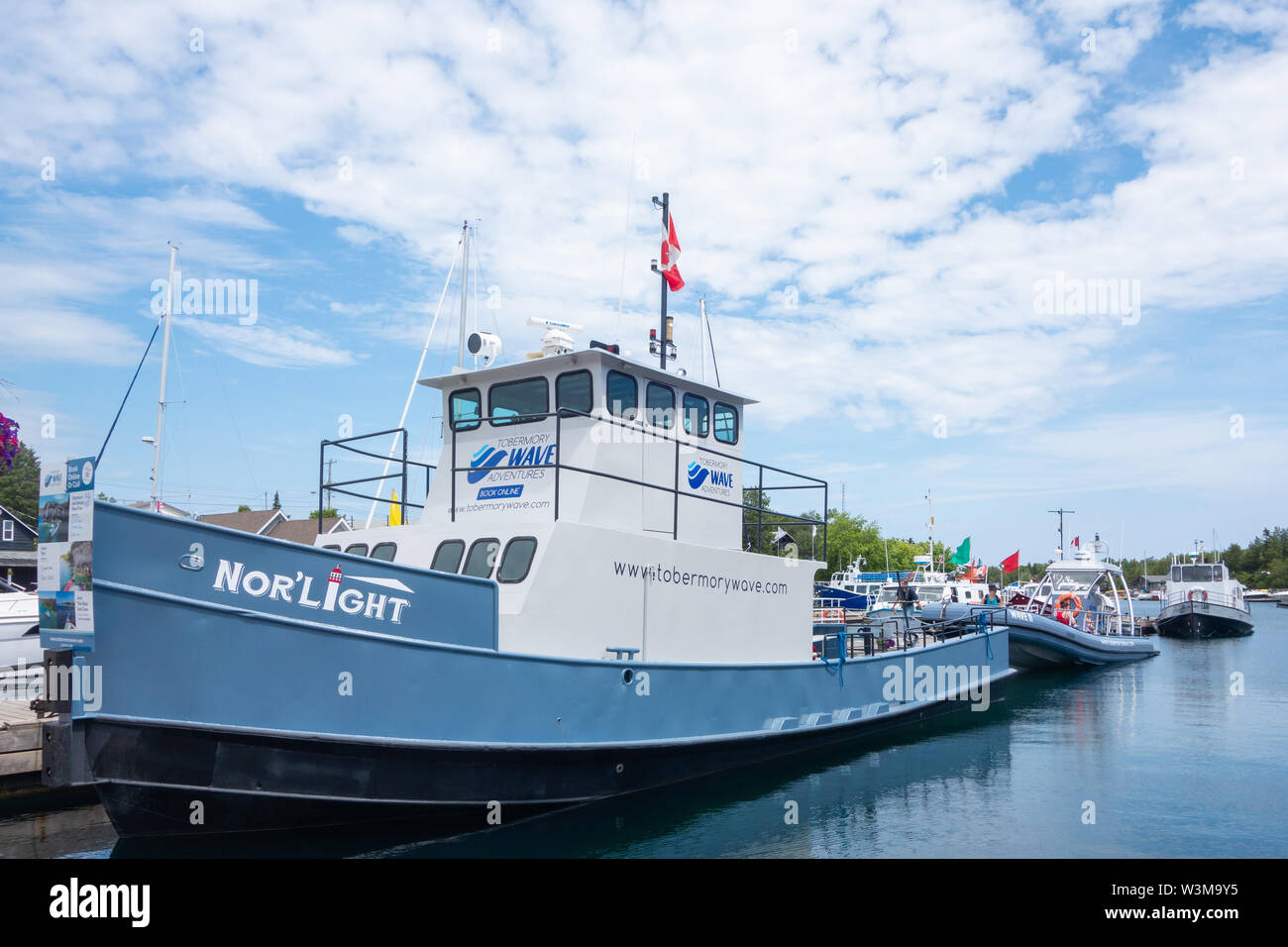 Tour boats docked in Little Tub Harbour in Tobermory Onatrio Canada in