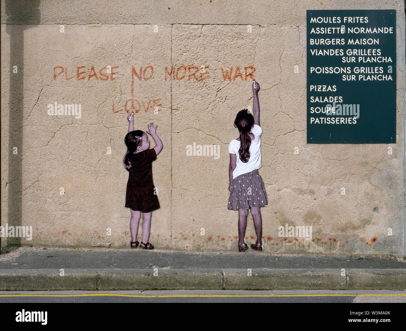 Please No More War, Love, a wall painting in Arromanches, Normandy France. Stock Photo