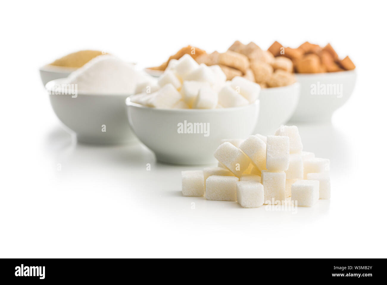Brown and white sugar isolated on white background. Stock Photo