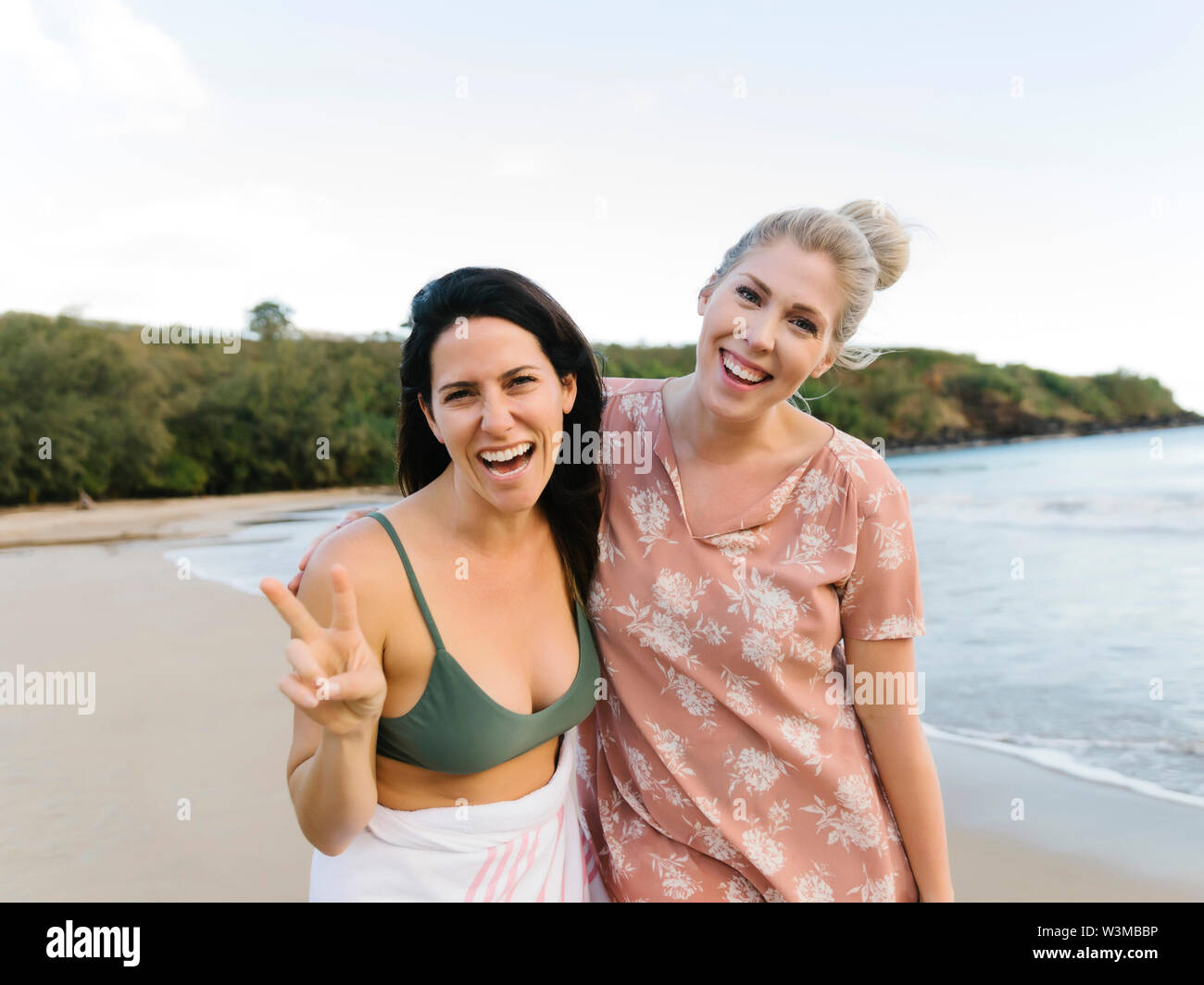 Smiling women on beach Stock Photo