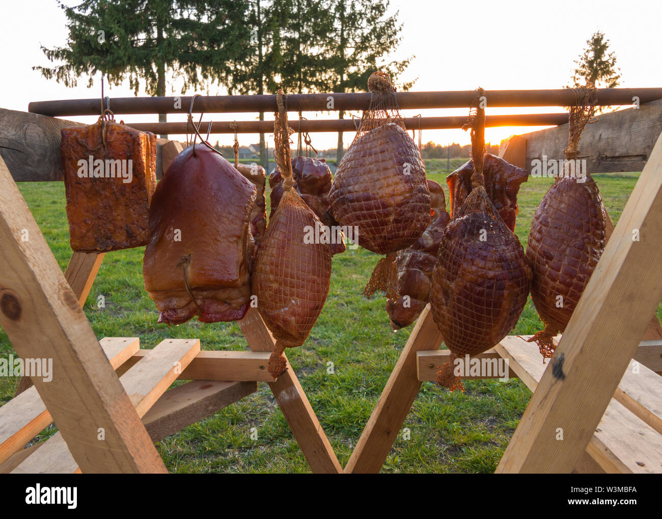 homemade smoked various meat drying after smoking process Stock Photo